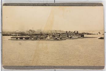 HINE, LEWIS W. (1874-1940) Family group at Ellis Island (with immigrants behind a hurricane fence).